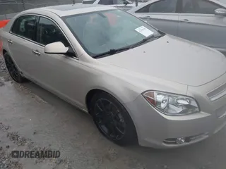2012 Chevrolet Malibu LTZ with VIN 1G1ZG5E77CF280287, listed as a IAAI auction lot 41299186 with 146,899 mi miles and . Bid and sale history available at DreamBid. Image 6.