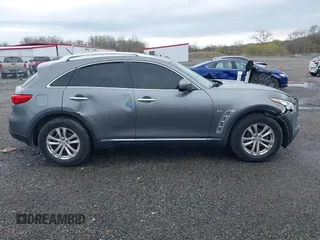 2016 Infiniti QX70 z VIN JN8CS1MW0GM400207, wystawiony jako IAAI lot #41952548 z przebiegiem 146 943 mil mil oraz . Historia ofert i sprzedaży dostępna na DreamBid. Obrazek 13.