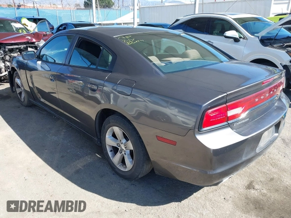 2013 Dodge Charger SE with VIN 2C3CDXBGXDH688230, listed as a IAAI auction lot 41634325 with 133,519 mi miles. Bid and sale history available at carsss.com. Image 3.