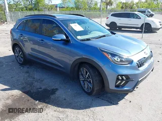 2021 Kia Niro Touring with VIN KNDCC3LC3M5483455, listed as a IAAI auction lot 41678795 with 132,216 mi miles. Bid and sale history available at carsss.com. Image 1.