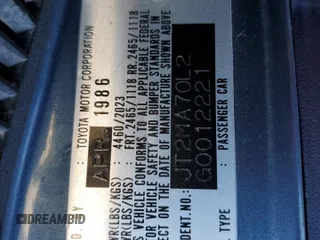 1986 Toyota Supra z VIN JT2MA70L2G0012221, wystawiony jako Copart lot #87328804 z przebiegiem 142 252 mil mil oraz Szkoda całkowita • Salvage title. Historia ofert i sprzedaży dostępna na DreamBid. Obrazek 12.