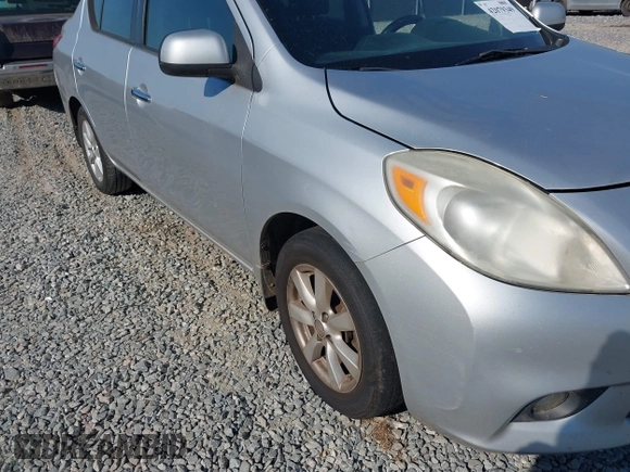 2012 Nissan Versa SV with VIN 3N1CN7APXCL867337, listed as a IAAI auction lot 42079349 with 260,442 mi miles. Bid and sale history available at carsss.com. Image 12.