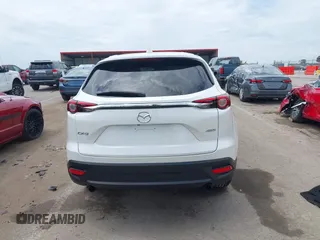 2018 Mazda CX-9 Touring с VIN JM3TCACY0J0214717, выставлен на аукционе IAAI как лот 42331827 с пробегом 116 470 миль миль и . История ставок и продаж доступна на DreamBid. Изображение 17.