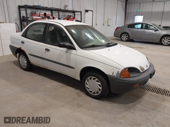 1996 Geo Metro z VIN 2C1MR529XT6777469, wystawiony jako IAAI lot #41392706 z przebiegiem 353 287 mil mil oraz . Historia ofert i sprzedaży dostępna na DreamBid. Obrazek 1.