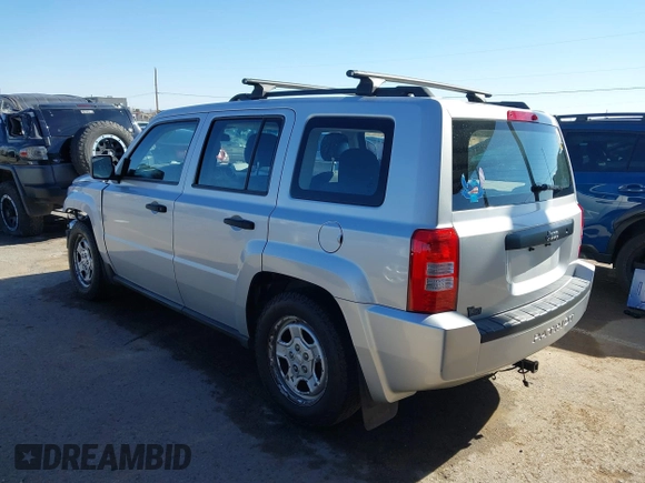 2010 Jeep Patriot Sport with VIN 1J4NT2GB1AD519675, listed as a IAAI auction lot 41321426 with 239,093 mi miles. Bid and sale history available at carsss.com. Image 3.