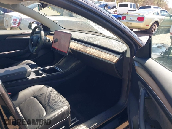 2022 Tesla Model 3 Long Range with VIN 5YJ3E1EB3NF104313, listed as a IAAI auction lot 41832803 with 39,061 mi miles and . Bid and sale history available at DreamBid. Image 5.