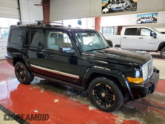 2006 Jeep Commander Limited with VIN 1J8HG58N96C300664, listed as a Copart auction lot 56022715 with 203,172 mi miles and Salvage title. Bid and sale history available at DreamBid. Image 4.
