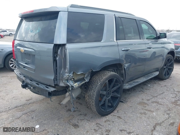 2020 Chevrolet Tahoe LT with VIN 1GNSKBKC4LR164705, listed as a IAAI auction lot 41699620 with 94,372 mi miles. Bid and sale history available at carsss.com. Image 4.