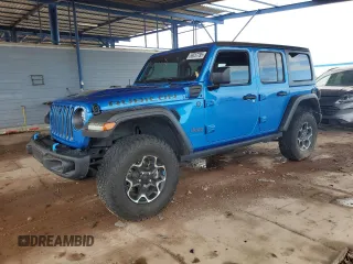 2023 Jeep Wrangler Rubicon with VIN 1C4JJXR69PW581362, listed as a Copart auction lot 58557795 with 34,357 mi miles and Salvage title. Bid and sale history available at DreamBid. Image 1.