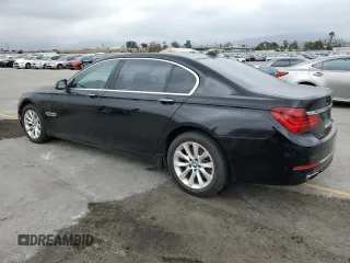 2015 BMW 7 Series 740Li with VIN WBAYE4C5XFD947497, listed as a Copart auction lot 55705975 with 257,496 mi miles and Clean Title. Bid and sale history available at DreamBid. Image 2.