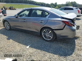 2018 Infiniti Q50 Luxe with VIN JN1EV7AR8JM443555, listed as a Copart auction lot 59691455 with 65,615 mi miles and Salvage title. Bid and sale history available at DreamBid. Image 2.