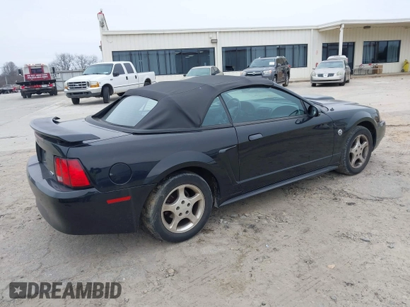 2004 Ford Mustang Deluxe with VIN 1FAFP44454F110688, listed as a IAAI auction lot 41371035 with 188,754 mi miles. Bid and sale history available at carsss.com. Image 4.