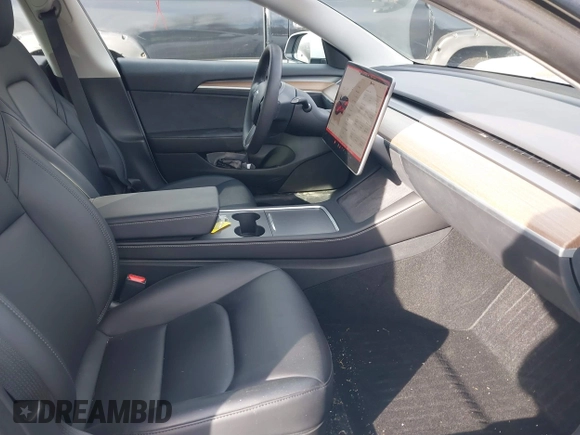 2023 Tesla Model 3 z VIN 5YJ3E1EAXPF543227, wystawiony jako IAAI lot #41150158 z przebiegiem 19 782 mil mil oraz . Historia ofert i sprzedaży dostępna na DreamBid. Obrazek 5.