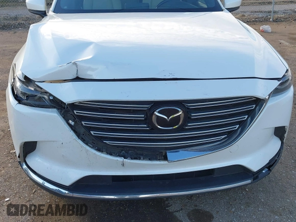2016 Mazda CX-9 Grand Touring z VIN JM3TCADY4G0124588, wystawiony jako IAAI lot #41192549 z przebiegiem 161 272 mil mil oraz . Historia ofert i sprzedaży dostępna na DreamBid. Obrazek 6.
