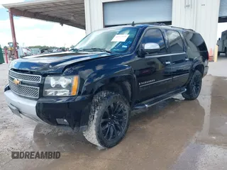 2007 Chevrolet Suburban LT with VIN 3GNFK16397G250068, listed as a IAAI auction lot 42513549 with 199,498 mi miles and . Bid and sale history available at DreamBid. Image 2.