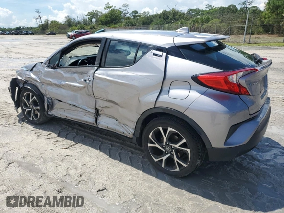 2018 Toyota C-HR XLE with VIN NMTKHMBX7JR021704, listed as a Copart auction lot 71171874 with 82,872 mi miles and Salvage Title. Bid and sale history available at DreamBid. Image 2.