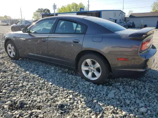 2014 Dodge Charger SXT with VIN 2C3CDXHG7EH238396, listed as a Copart auction lot 52181305 with 129,599 mi miles and Salvage Title. Bid and sale history available at carsss.com. Image 2.