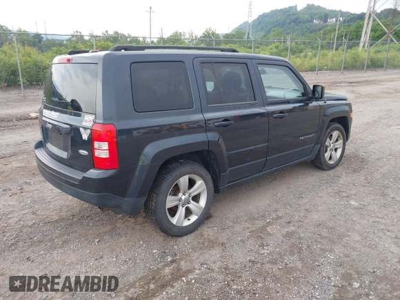 2014 Jeep Patriot Latitude with VIN 1C4NJRFB0ED641875, listed as a IAAI auction lot 42447186 with 137,499 mi miles and . Bid and sale history available at DreamBid. Image 4.