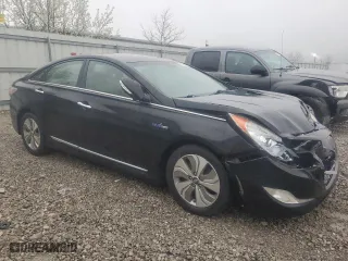 2013 Hyundai Sonata Hybrid with VIN KMHEC4A40DA089974, listed as a Copart auction lot 51865155 with 0 mi miles and Salvage Title. Bid and sale history available at carsss.com. Image 4.
