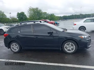 2018 Subaru Impreza Premium z VIN 4S3GTAD64J3705443, wystawiony jako IAAI lot #42304055 z przebiegiem 159 572 mil mil oraz . Historia ofert i sprzedaży dostępna na DreamBid. Obrazek 13.