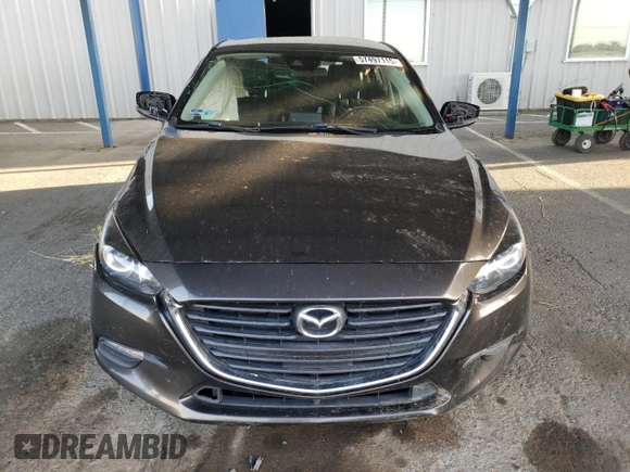 2018 Mazda 3 Touring z VIN 3MZBN1L30JM195471, wystawiony jako Copart lot #57497115 z przebiegiem 147 899 mil mil oraz Szkoda całkowita • Salvage title. Historia ofert i sprzedaży dostępna na DreamBid. Obrazek 5.
