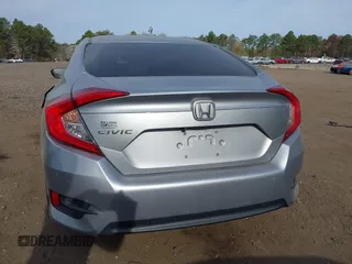 2018 Honda Civic Sedan LX with VIN 2HGFC2F5XJH573938, listed as a IAAI auction lot 42098109 with 69,037 mi miles. Bid and sale history available at carsss.com. Image 16.