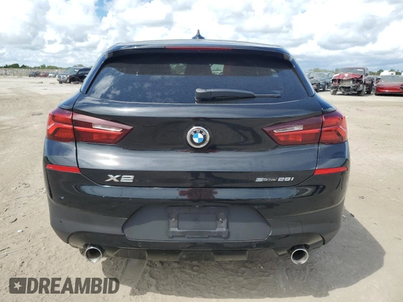 2022 BMW X2 sDrive28i with VIN WBXYH9C0XN5T86256, listed as a Copart auction lot 74173554 with 35,658 mi miles and Salvage Title. Bid and sale history available at carsss.com. Image 6.