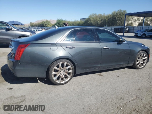 2014 Cadillac CTS Premium AWD with VIN 1G6AZ5S34E0123356, listed as a Copart auction lot 69327504 with 136,292 mi miles and Salvage Title. Bid and sale history available at DreamBid. Image 3.