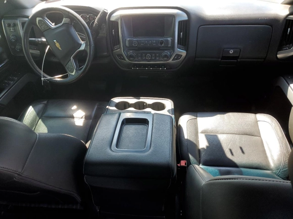 2017 Chevrolet Silverado 1500 LT with VIN 3GCUKREC0HG335785, listed as a Copart auction lot 51456305 with 104,614 mi miles and Salvage Title. Bid and sale history available at DreamBid. Image 8.