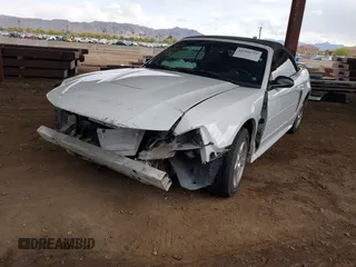 2004 Ford Mustang Deluxe with VIN 1FAFP446X4F133790, listed as a IAAI auction lot 41950759 with 133,734 mi miles. Bid and sale history available at carsss.com. Image 18.