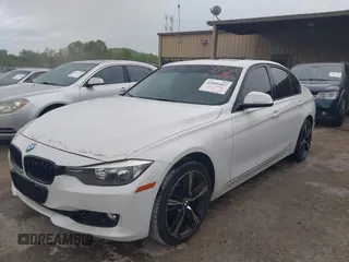 2012 BMW 3 Series 328i with VIN WBA3A5G57CNP16102, listed as a IAAI auction lot 42088407 with 70,608 mi miles and . Bid and sale history available at carsss.com. Image 2.