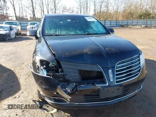 2018 Lincoln MKT with VIN 2LMHJ5NK5JBL02245, listed as a IAAI auction lot 41430571 with 293,537 mi miles and . Bid and sale history available at carsss.com. Image 6.