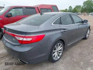 2013 Hyundai Azera z VIN KMHFH4JGXDA323375, wystawiony jako IAAI lot #42221412 z przebiegiem 111 244 mil mil oraz . Historia ofert i sprzedaży dostępna na DreamBid. Obrazek 4.