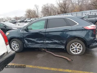2022 Ford Edge SEL z VIN 2FMPK4J90NBA71360, wystawiony jako IAAI lot #41724316 z przebiegiem 35 309 mil mil oraz . Historia ofert i sprzedaży dostępna na DreamBid. Obrazek 15.