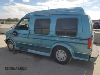 1995 GMC Safari z VIN 1GDDM19W2SB525888, wystawiony jako Copart lot #81358954 z przebiegiem 121 066 mil mil oraz Szkody całkowita. Historia ofert i sprzedaży dostępna na DreamBid. Obrazek 2.