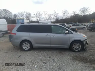 2014 Toyota Sienna XLE with VIN 5TDYK3DC0ES421501, listed as a IAAI auction lot 41672414 with 111,911 mi miles. Bid and sale history available at carsss.com. Image 13.