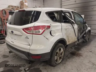 2013 Ford Escape SE with VIN 1FMCU9GX8DUC68815, listed as a IAAI auction lot 42028850 with 83,297 mi miles and . Bid and sale history available at DreamBid. Image 4.