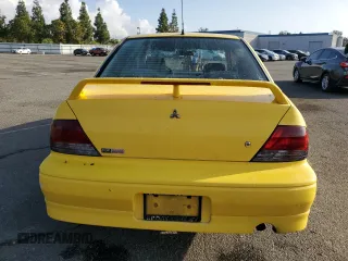 2002 Mitsubishi Lancer OZ-Rally with VIN JA3AJ86E82U071265, listed as a Copart auction lot 77711904 with 174,088 mi miles and Salvage Title. Bid and sale history available at carsss.com. Image 6.