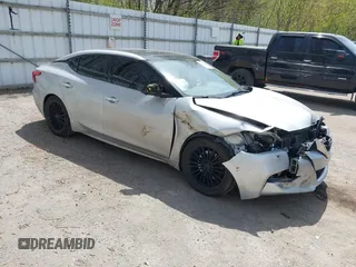 2016 Nissan Maxima SV z VIN 1N4AA6APXGC383279, wystawiony jako IAAI lot #42144003 z przebiegiem 141 099 mil mil oraz . Historia ofert i sprzedaży dostępna na DreamBid. Obrazek 1.