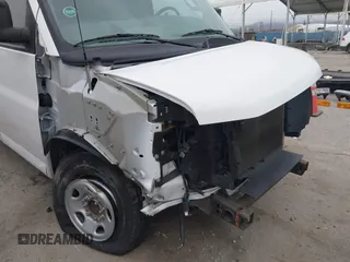 2019 Chevrolet Express Cargo Van with VIN 1GCWGAFP6K1243793, listed as a IAAI auction lot 41799107 with 106,566 mi miles. Bid and sale history available at carsss.com. Image 6.