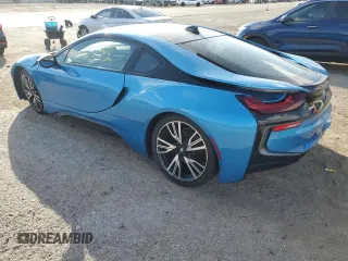 2016 BMW i8 z VIN WBY2Z2C54GV675234, wystawiony jako Copart lot #74126583 z przebiegiem 6272 mil mil oraz Szkody całkowita. Historia ofert i sprzedaży dostępna na DreamBid. Obrazek 2.