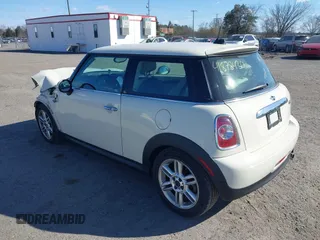 2012 MINI Hardtop with VIN WMWSU3C59CT255588, listed as a IAAI auction lot 41878430 with 103,033 mi miles and . Bid and sale history available at DreamBid. Image 3.