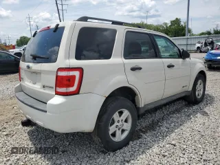 2009 Ford Escape Hybrid with VIN 1FMCU59309KC19243, listed as a Copart auction lot 61416915 with 74,732 mi miles and Salvage title. Bid and sale history available at DreamBid. Image 3.