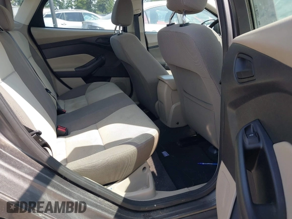 2012 Ford Focus SE with VIN 1FAHP3F25CL260962, listed as a IAAI auction lot 42588485 with 143,679 mi miles and . Bid and sale history available at DreamBid. Image 8.