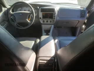2002 Ford Explorer with VIN 1FMCU60E52UB90353, listed as a Copart auction lot 75659554 with 212,592 mi miles and Salvage title. Bid and sale history available at DreamBid. Image 8.