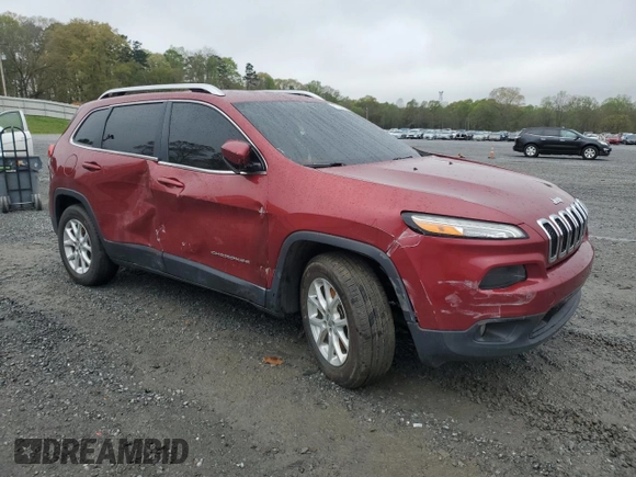 2014 Jeep Cherokee Altitude with VIN 1C4PJMCB7EW141684, listed as a Copart auction lot 51260065 with 163,656 mi miles and Salvage Title. Bid and sale history available at carsss.com. Image 4.