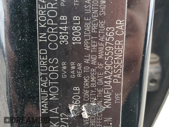 2012 Kia Forte EX with VIN KNAFU4A29C5597563, listed as a Copart auction lot 69807704 with 98,267 mi miles and Salvage Title. Bid and sale history available at carsss.com. Image 14.
