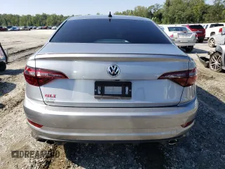 2020 Volkswagen Jetta GLI S z VIN 3VW5T7BUXLM010832, wystawiony jako Copart lot #66376523 z przebiegiem 66 434 mil mil oraz . Historia ofert i sprzedaży dostępna na DreamBid. Obrazek 6.