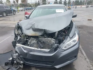 2016 Nissan Altima S with VIN 1N4AL3AP0GN329616, listed as a IAAI auction lot 41795725 with Not Provided miles and . Bid and sale history available at carsss.com. Image 12.
