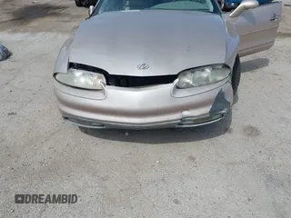 1999 Oldsmobile Aurora z VIN 1G3GR62C5X4114285, wystawiony jako IAAI lot #42271517 z przebiegiem 308 731 mil mil oraz . Historia ofert i sprzedaży dostępna na DreamBid. Obrazek 6.